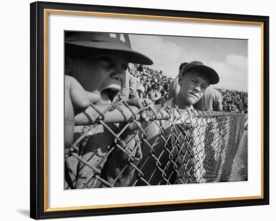 Young Fans Standing at Fence Which Borders Field at World Series Game, Braves vs. Yankees-Grey Villet-Framed Photographic Print