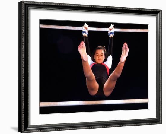 Young Female Gymnast on the Uneven Bars-Bill Bachmann-Framed Photographic Print