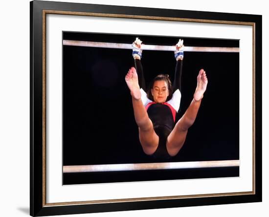 Young Female Gymnast on the Uneven Bars-Bill Bachmann-Framed Photographic Print