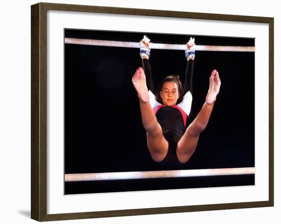 Young Female Gymnast on the Uneven Bars-Bill Bachmann-Framed Photographic Print