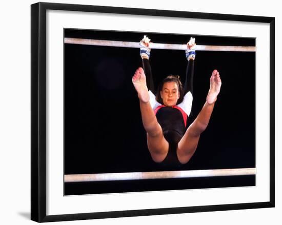 Young Female Gymnast on the Uneven Bars-Bill Bachmann-Framed Photographic Print