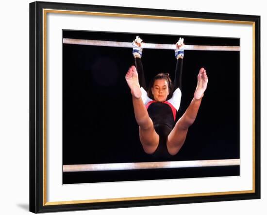 Young Female Gymnast on the Uneven Bars-Bill Bachmann-Framed Photographic Print