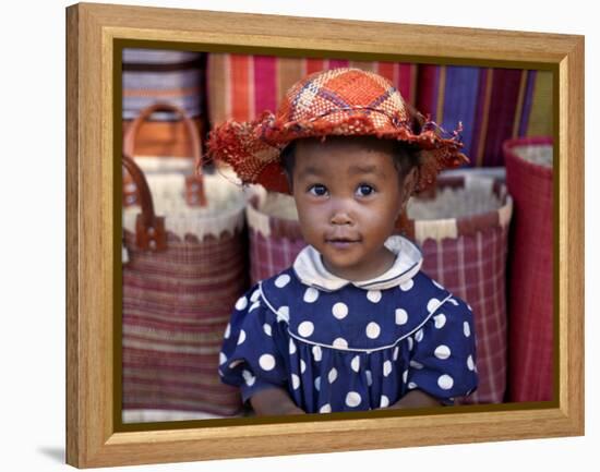 Young Girl Beside a Road-Side Stall Near Antananarivo, Capital of Madagascar-Nigel Pavitt-Framed Premier Image Canvas