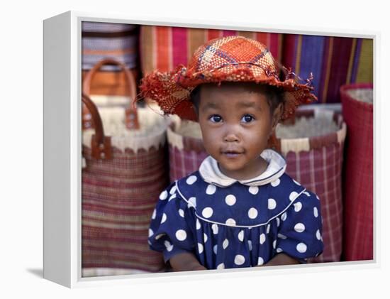 Young Girl Beside a Road-Side Stall Near Antananarivo, Capital of Madagascar-Nigel Pavitt-Framed Premier Image Canvas