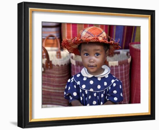 Young Girl Beside a Road-Side Stall Near Antananarivo, Capital of Madagascar-Nigel Pavitt-Framed Photographic Print