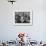 Young Girl Blowing a Bubble with Her Friends Watching-Bob Landry-Framed Photographic Print displayed on a wall