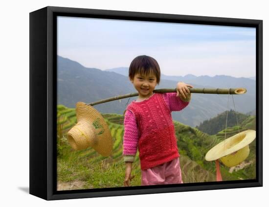 Young Girl Carrying Shoulder Pole with Straw Hats, China-Keren Su-Framed Premier Image Canvas