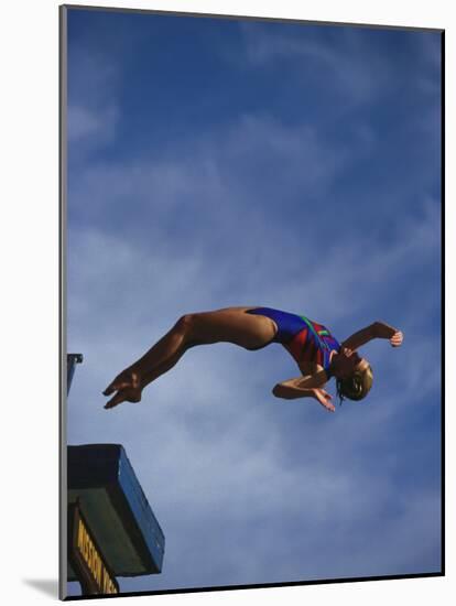 Young Girl Diving Off the 10M Platform-Paul Sutton-Mounted Photographic Print