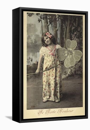 Young Girl Holding Giant Four-Leaf Clover-null-Framed Premier Image Canvas
