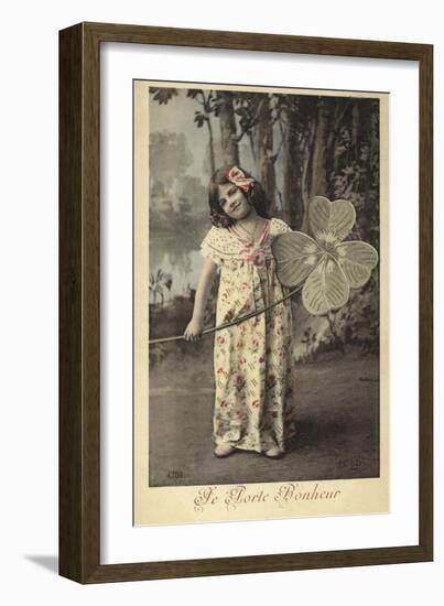 Young Girl Holding Giant Four-Leaf Clover-null-Framed Photographic Print