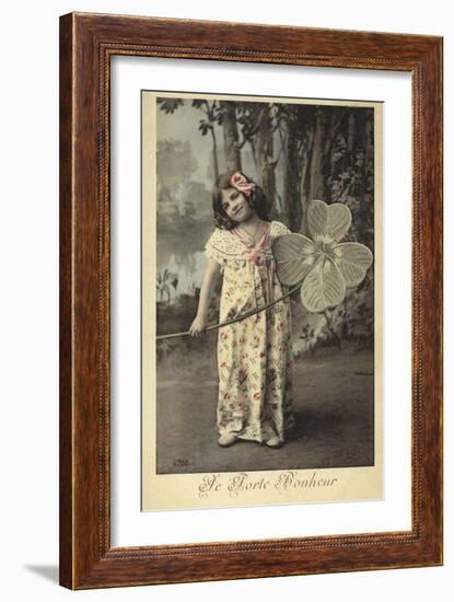 Young Girl Holding Giant Four-Leaf Clover-null-Framed Photographic Print