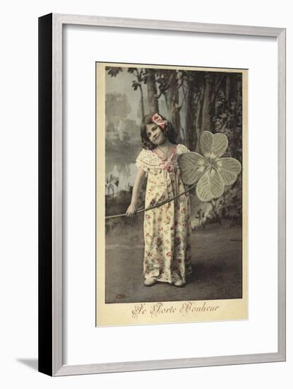 Young Girl Holding Giant Four-Leaf Clover-null-Framed Photographic Print