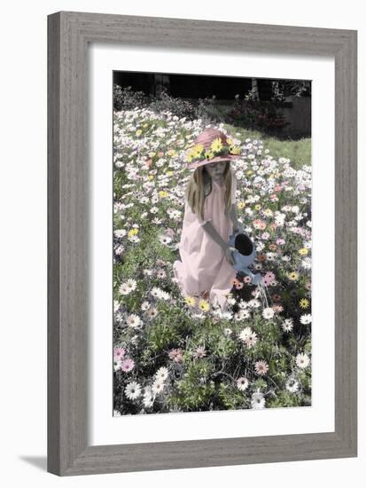 Young Girl in a Field of Flowers Watering Them-Nora Hernandez-Framed Giclee Print