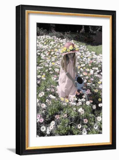 Young Girl in a Field of Flowers Watering Them-Nora Hernandez-Framed Giclee Print