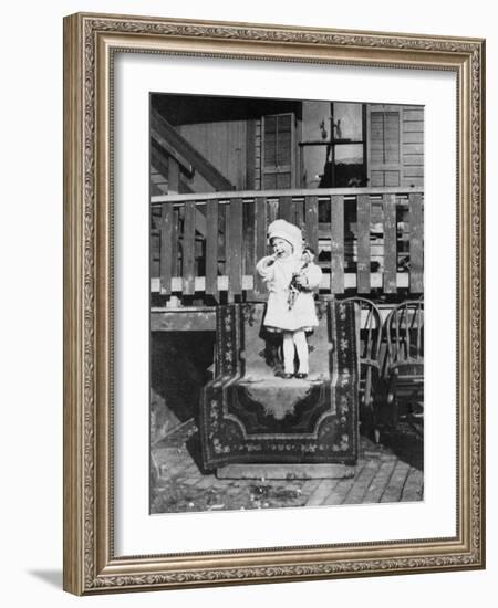 Young Girl Outside Her House, Ca. 1921-null-Framed Photographic Print