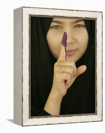 Young Girl Shows Her Inked Finger, Even Though She Was Too Young to Vote, in Karbala, Iraq-null-Framed Premier Image Canvas