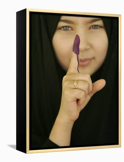 Young Girl Shows Her Inked Finger, Even Though She Was Too Young to Vote, in Karbala, Iraq-null-Framed Premier Image Canvas
