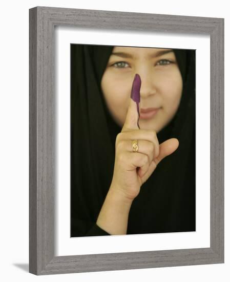 Young Girl Shows Her Inked Finger, Even Though She Was Too Young to Vote, in Karbala, Iraq-null-Framed Photographic Print