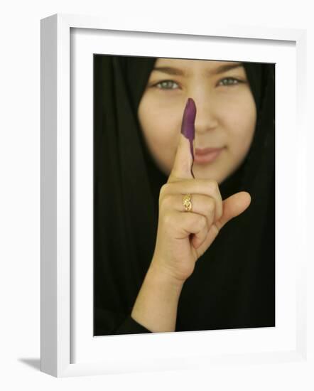 Young Girl Shows Her Inked Finger, Even Though She Was Too Young to Vote, in Karbala, Iraq-null-Framed Photographic Print