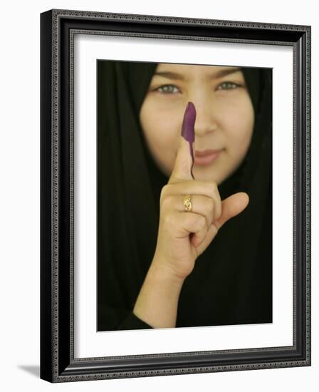 Young Girl Shows Her Inked Finger, Even Though She Was Too Young to Vote, in Karbala, Iraq-null-Framed Photographic Print