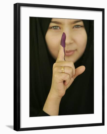 Young Girl Shows Her Inked Finger, Even Though She Was Too Young to Vote, in Karbala, Iraq-null-Framed Photographic Print