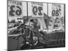 Young Girl Sitting on a Coin Rider Reading a Comic Book at the Supermarket-Dmitri Kessel-Mounted Photographic Print