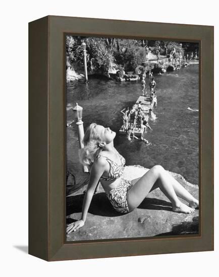 Young Girl Sunbathing at the Venetian Pool-Allan Grant-Framed Premier Image Canvas