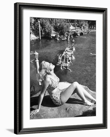 Young Girl Sunbathing at the Venetian Pool-Allan Grant-Framed Photographic Print