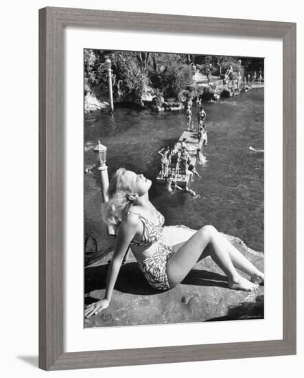 Young Girl Sunbathing at the Venetian Pool-Allan Grant-Framed Photographic Print
