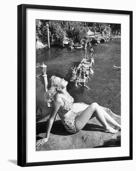 Young Girl Sunbathing at the Venetian Pool-Allan Grant-Framed Photographic Print