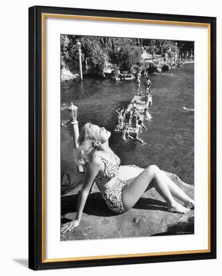 Young Girl Sunbathing at the Venetian Pool-Allan Grant-Framed Photographic Print