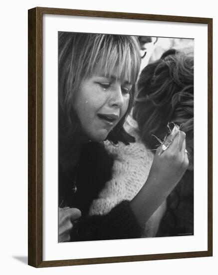 Young Girl Weeping, The Beatles' Fan Clutches Tuft of Grass on Which Ringo Had Walked On-Bill Ray-Framed Photographic Print