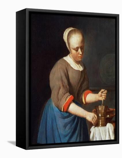 Young Girl with a Pestle and Mortar-Gabriel Metsu-Framed Premier Image Canvas