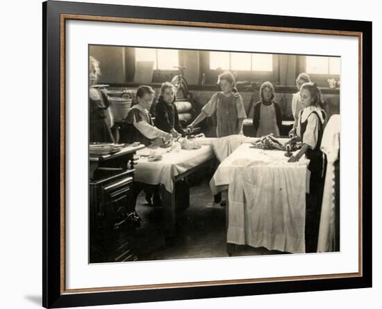 Young Girls Ironing in Laundry Room, Surrey-Peter Higginbotham-Framed Photographic Print