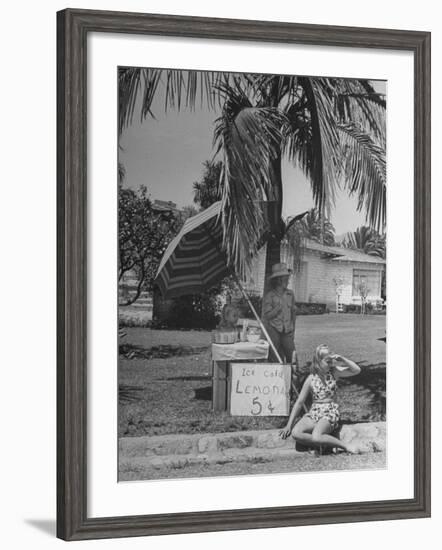 Young Girls Selling Lemonade from a Sidewalk Stand-Nina Leen-Framed Photographic Print