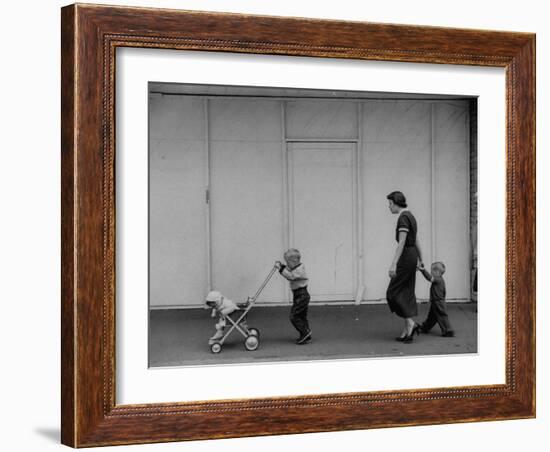 Young Housewife Walking with Her Three Children-Mark Kauffman-Framed Photographic Print