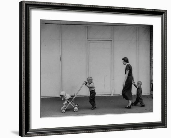 Young Housewife Walking with Her Three Children-Mark Kauffman-Framed Photographic Print