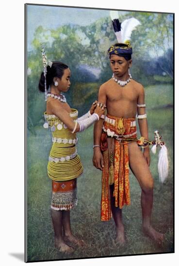 Young Iban or Sea Dayaks People in Gala Attire, Borneo, 1922-Charles Hose-Mounted Giclee Print