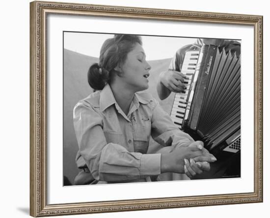 Young Israeli Woman Singing While Accompanied by Someone Playing an Accordion-Paul Schutzer-Framed Photographic Print