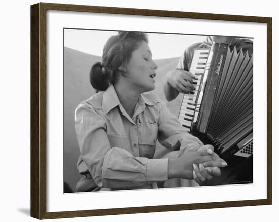 Young Israeli Woman Singing While Accompanied by Someone Playing an Accordion-Paul Schutzer-Framed Photographic Print