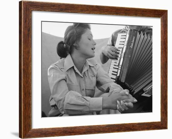 Young Israeli Woman Singing While Accompanied by Someone Playing an Accordion-Paul Schutzer-Framed Photographic Print