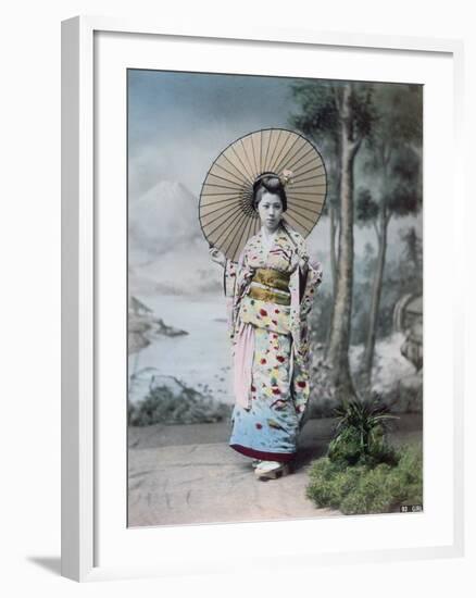 Young Japanese Girl in a Kimono and with a Parasol, Mt.Fuji in the Background, c.1900-Japanese Photographer-Framed Photographic Print