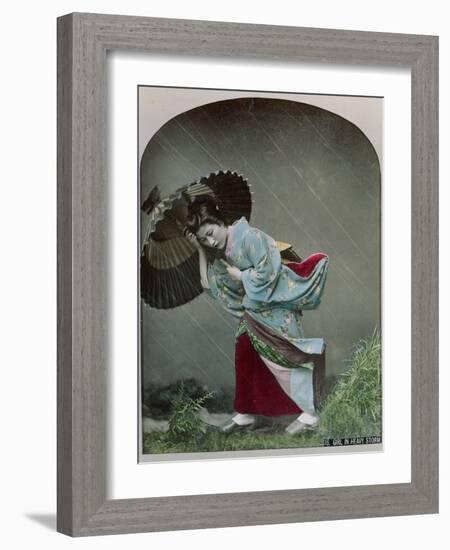 Young Japanese Girl in the Rain, c.1900-Japanese Photographer-Framed Photographic Print