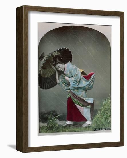 Young Japanese Girl in the Rain, c.1900-Japanese Photographer-Framed Photographic Print