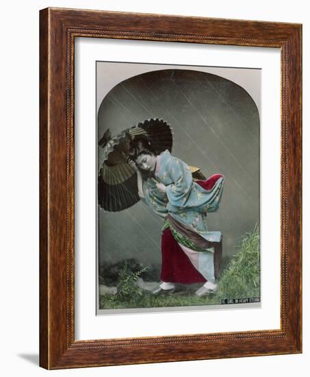 Young Japanese Girl in the Rain, c.1900-Japanese Photographer-Framed Photographic Print