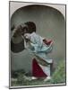 Young Japanese Girl in the Rain, c.1900-Japanese Photographer-Mounted Photographic Print