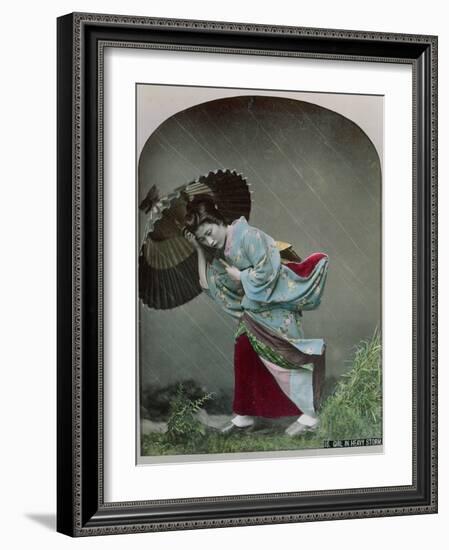 Young Japanese Girl in the Rain, c.1900-Japanese Photographer-Framed Photographic Print