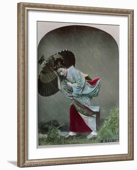 Young Japanese Girl in the Rain, c.1900-Japanese Photographer-Framed Photographic Print