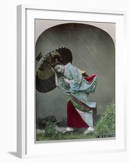 Young Japanese Girl in the Rain, c.1900-Japanese Photographer-Framed Photographic Print