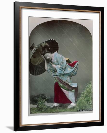 Young Japanese Girl in the Rain, c.1900-Japanese Photographer-Framed Photographic Print